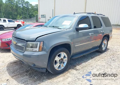 2010 Chevrolet Tahoe Ltz from USA, damaged, VIN 1GNUCCE07AR241576